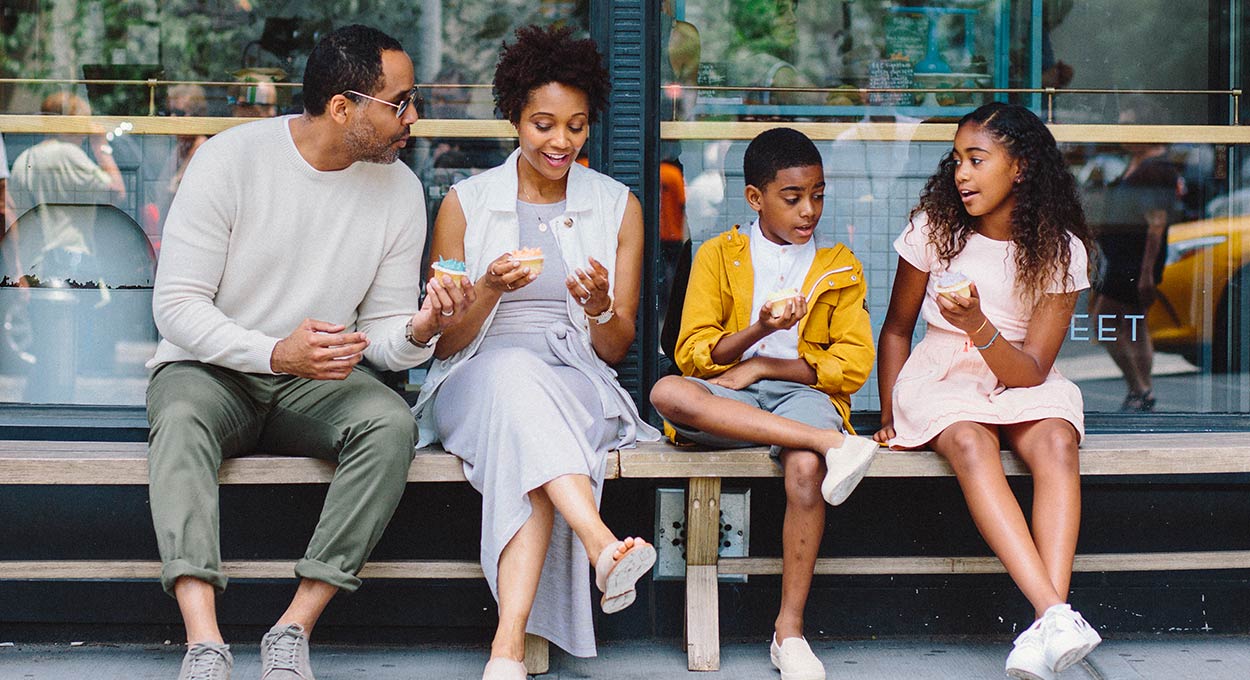 Family enjoying icecream outside
